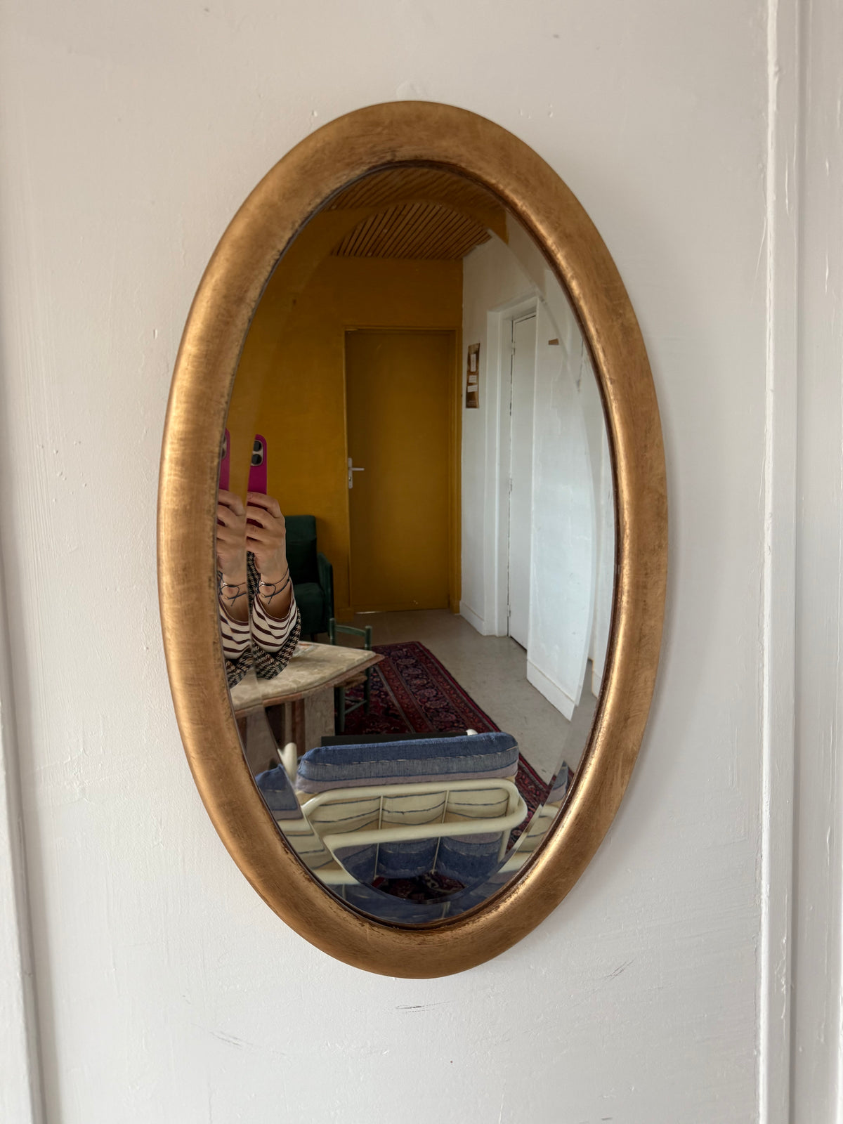 Miroir doré ovale ancien glace biseautée